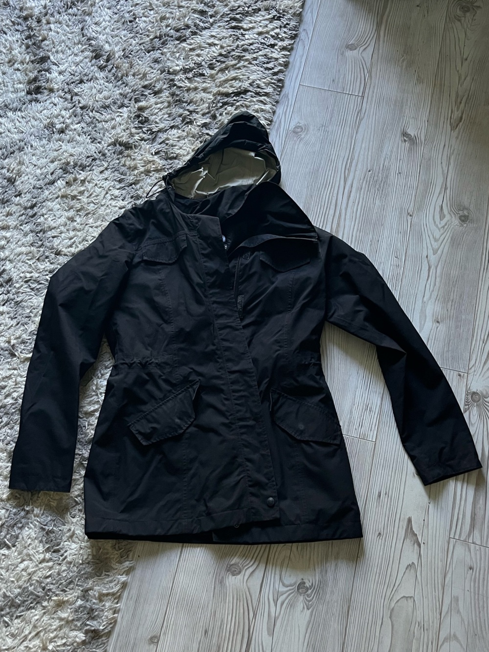 The North Face Black mid length rain coat